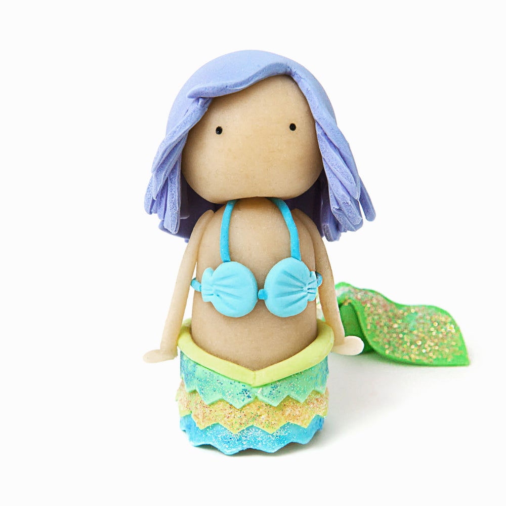 Image of mermaid with fin: purple hair, blue/green suit