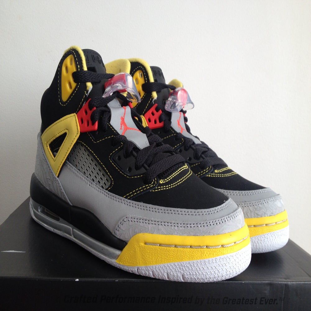 spizike yellow and black