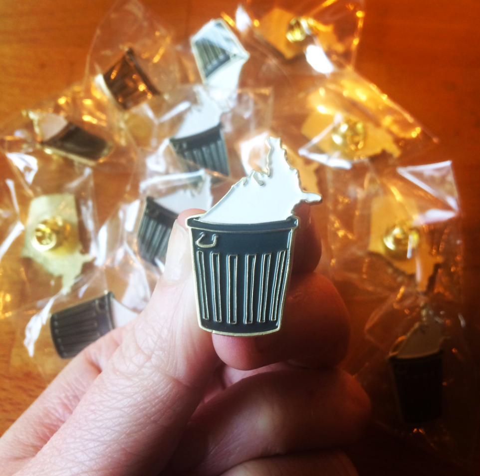 Image of America in the Garbage enamel pin