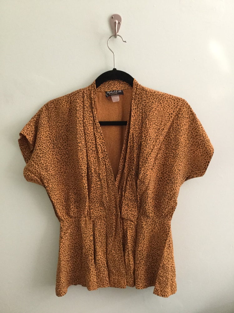 Image of leopard print blouse