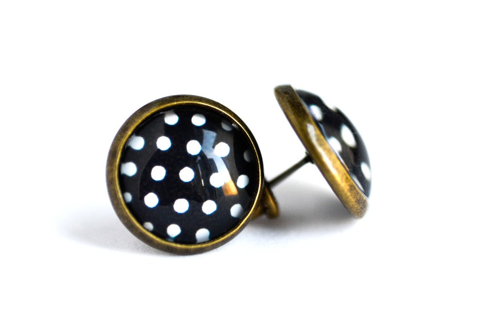 Image of Puce d'oreilles à pois noir et blanc intemporel